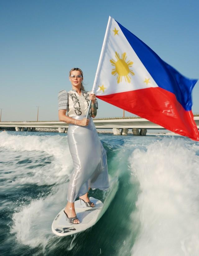 Karolina Agata Sankiewicz, known as 'Surfing Barbie,' drew mixed reactions in June for this viral video of her surfing with the Philippine flag.