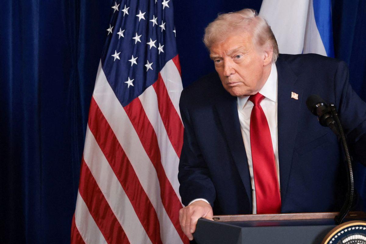 US President Donald Trump attends a press conference