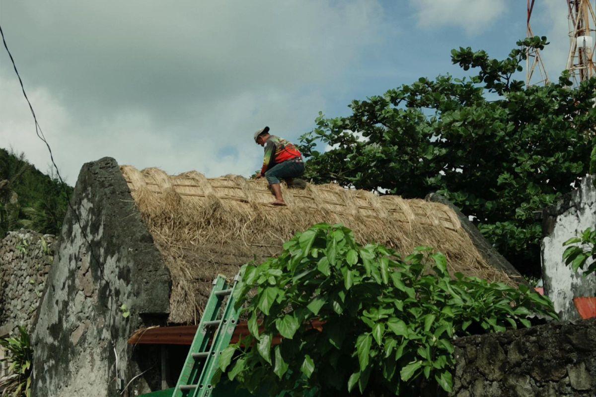 Repair work on the roof of an Ivatan home in Uyugan, Batanes