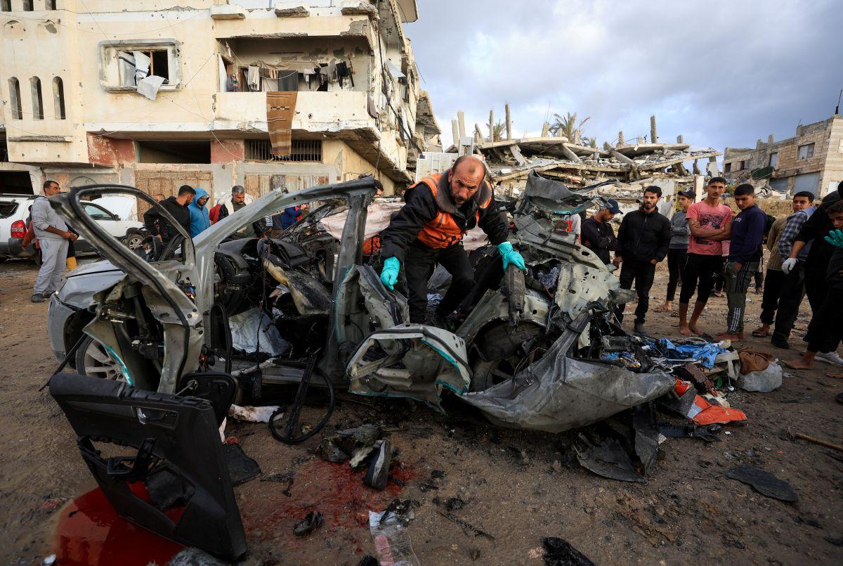 Aftermath of an Israeli strike on a car in Gaza City