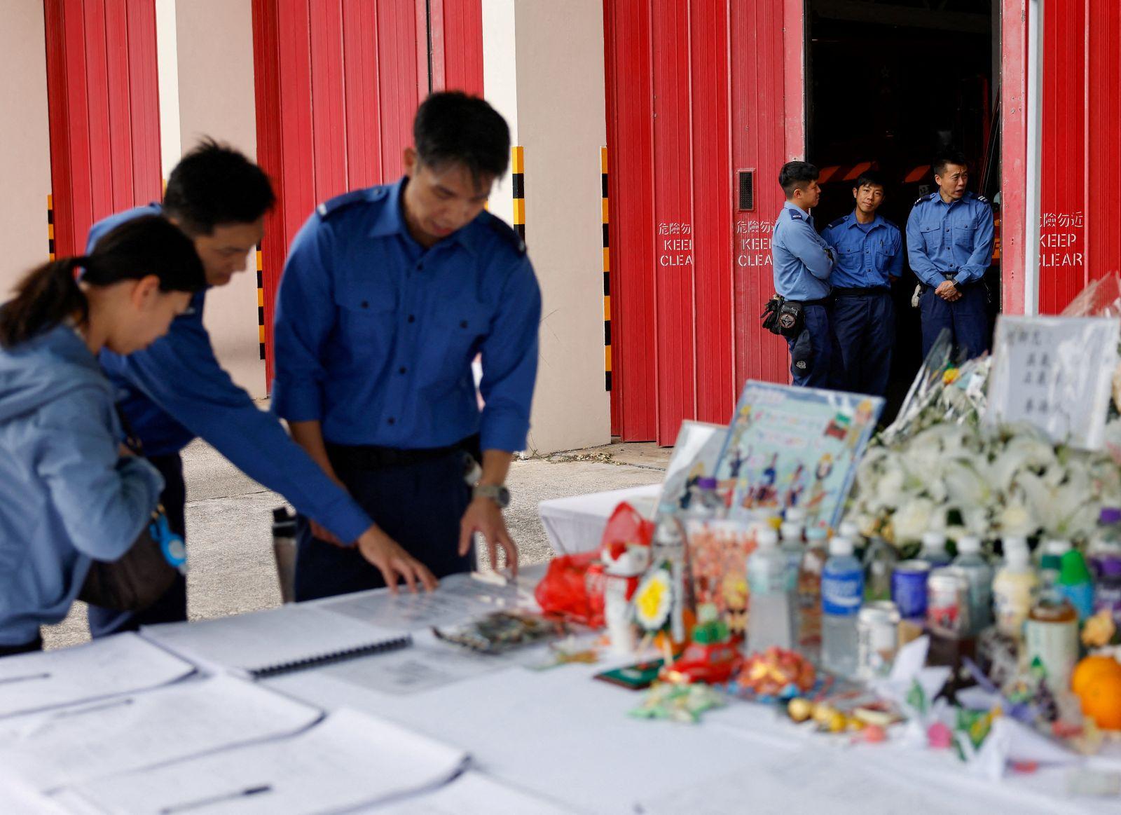 Hong Kong orders judge-led probe into fire that killed 151