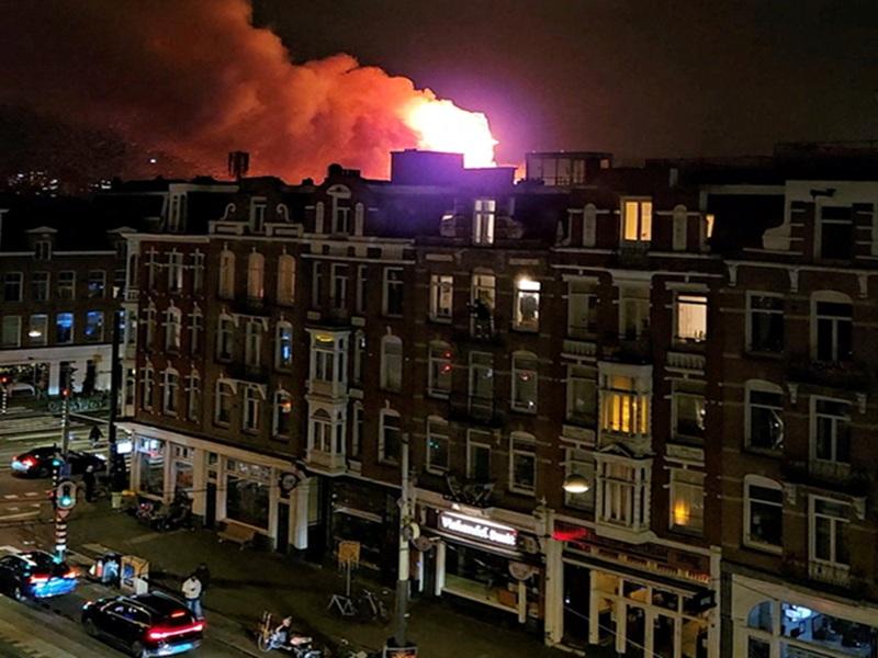 Fireworks accidents kill two in the Netherlands; fire destroys historic Amsterdam church