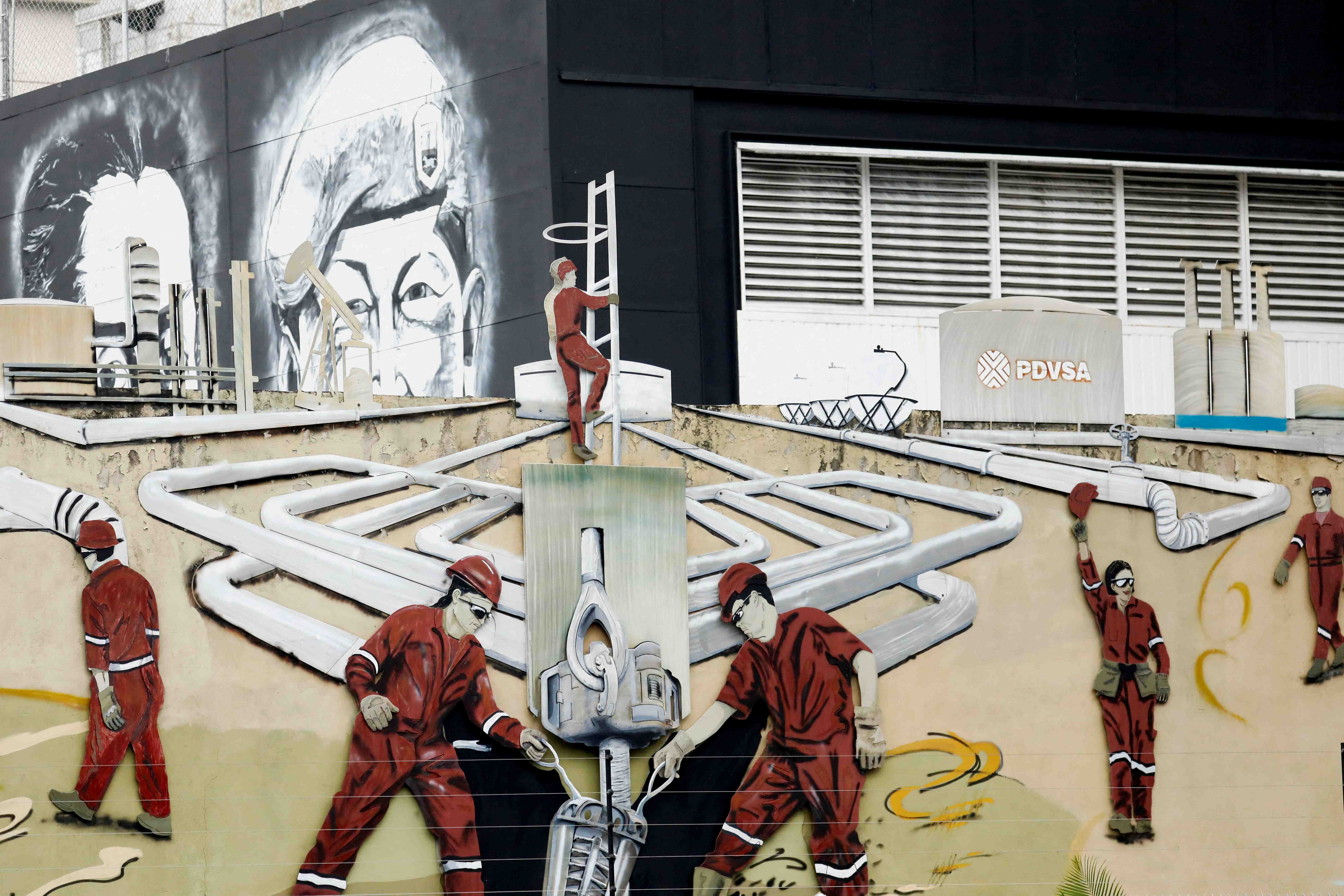 A mural depicting oil workers of Venezuelan state oil company PDVSA