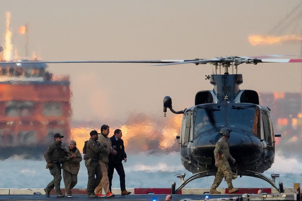 Venezuela's Maduro at US court, substitute leader softens stance