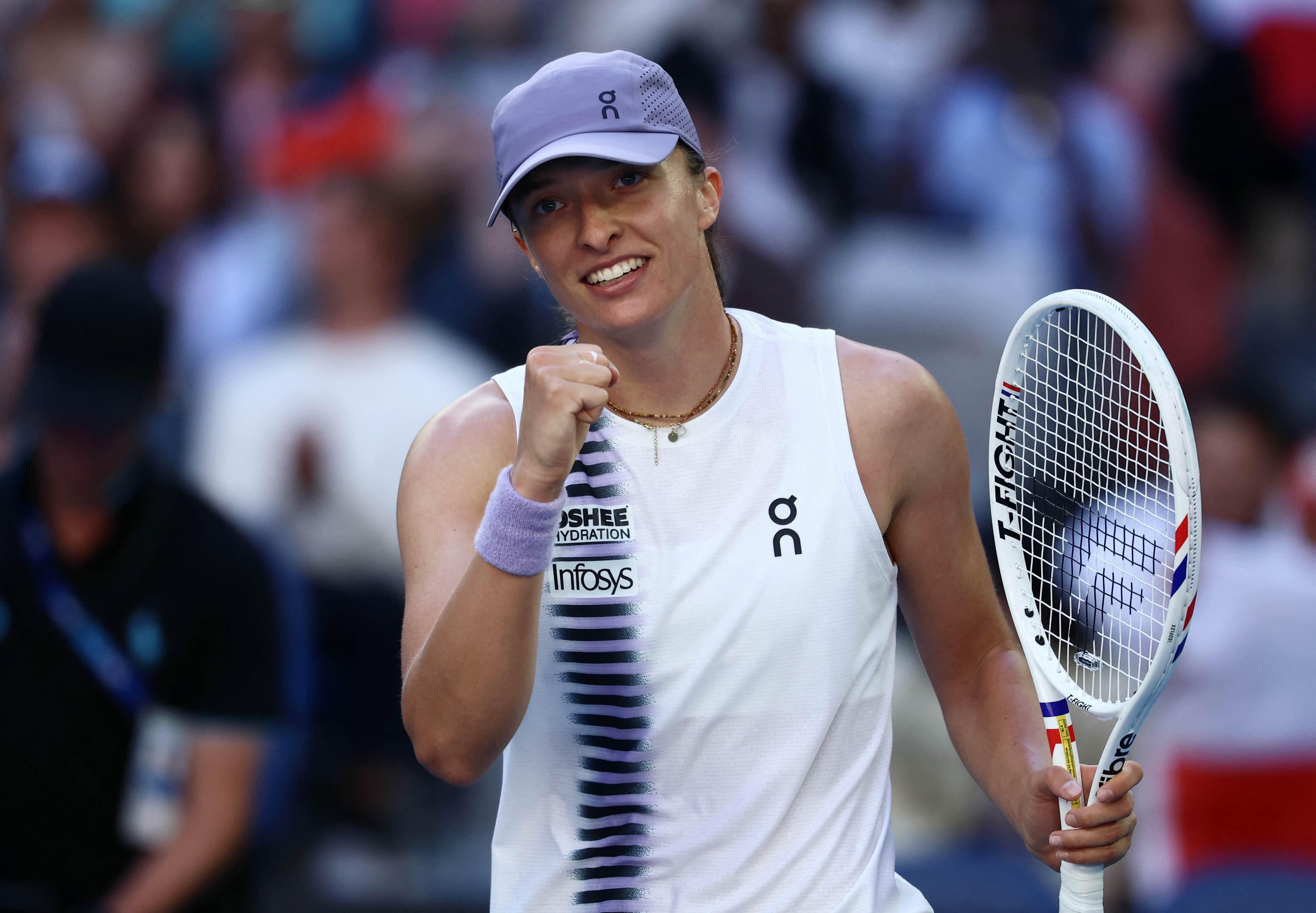 Swiatek sees off Bouzkova to reach Australian Open third round