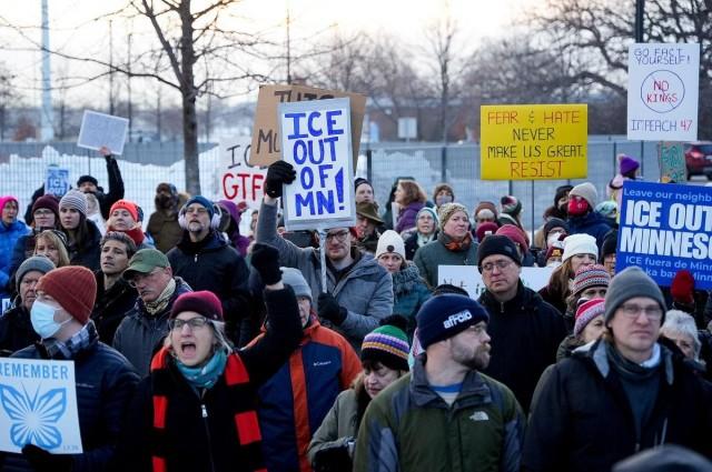 People protest against the fatal shooting of Renee Nicole Good by a US Immigration and Customs Enforcement (ICE) agent, during a rally against increased immigration enforcement across the city outside the Whipple Building in Minneapolis, Minnesota, January 8, 2026. REUTERS/ Tim Evans