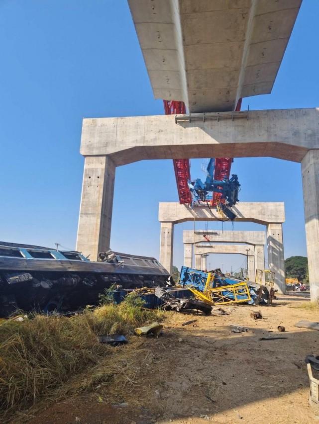 A train traveling from Bangkok to Ubon Ratchathani lies damaged after being derailed when a construction crane fell onto one of its carriages, causing multiple casualties, in Sikhio district, Nakhon Ratchasima province, Thailand, January 14, 2026. Ministry of Transport/ Handout via REUTERS