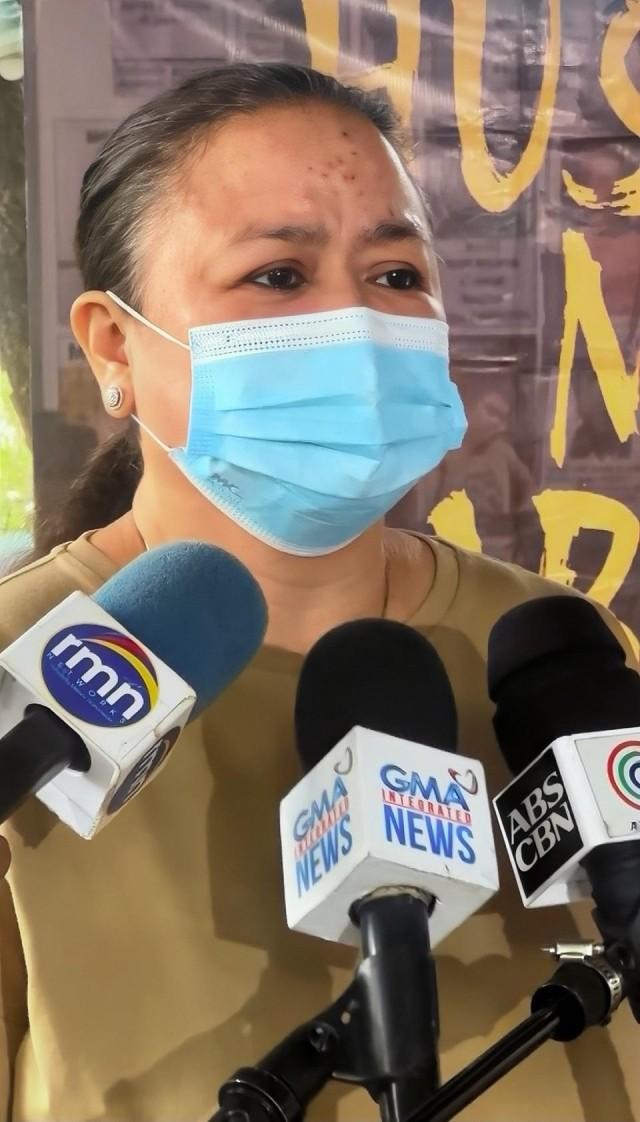 Charlene Lasco Biligan, sister of missing sabungero Ricardo Jonjon Ricafort Lasco Jr., speaks to the media after a warrant is issued against Atong Ang, Jan. 14, 2026. JP Soriano/GMA Integrated News