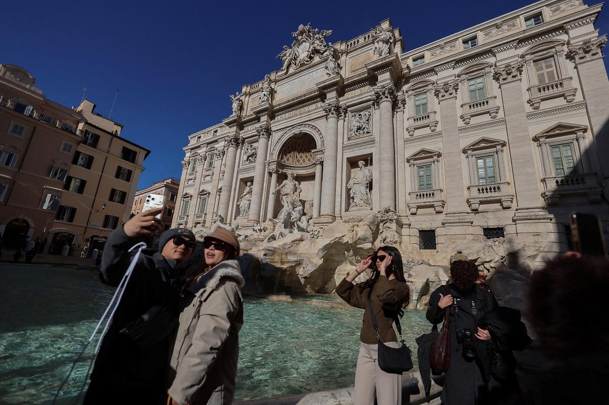 Rome introduces Trevi Fountain access fee to curb coin-tossing crowds