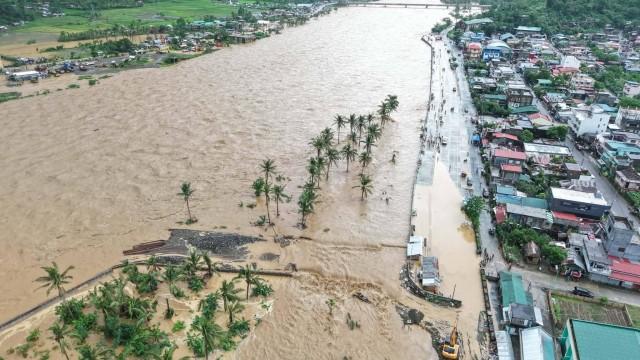 The Bato River overflows on Sunday, Feb, 8, 2026, due to heavy rains brought by the shear line. Photo: Bato PNP Catanduanes on Facebook