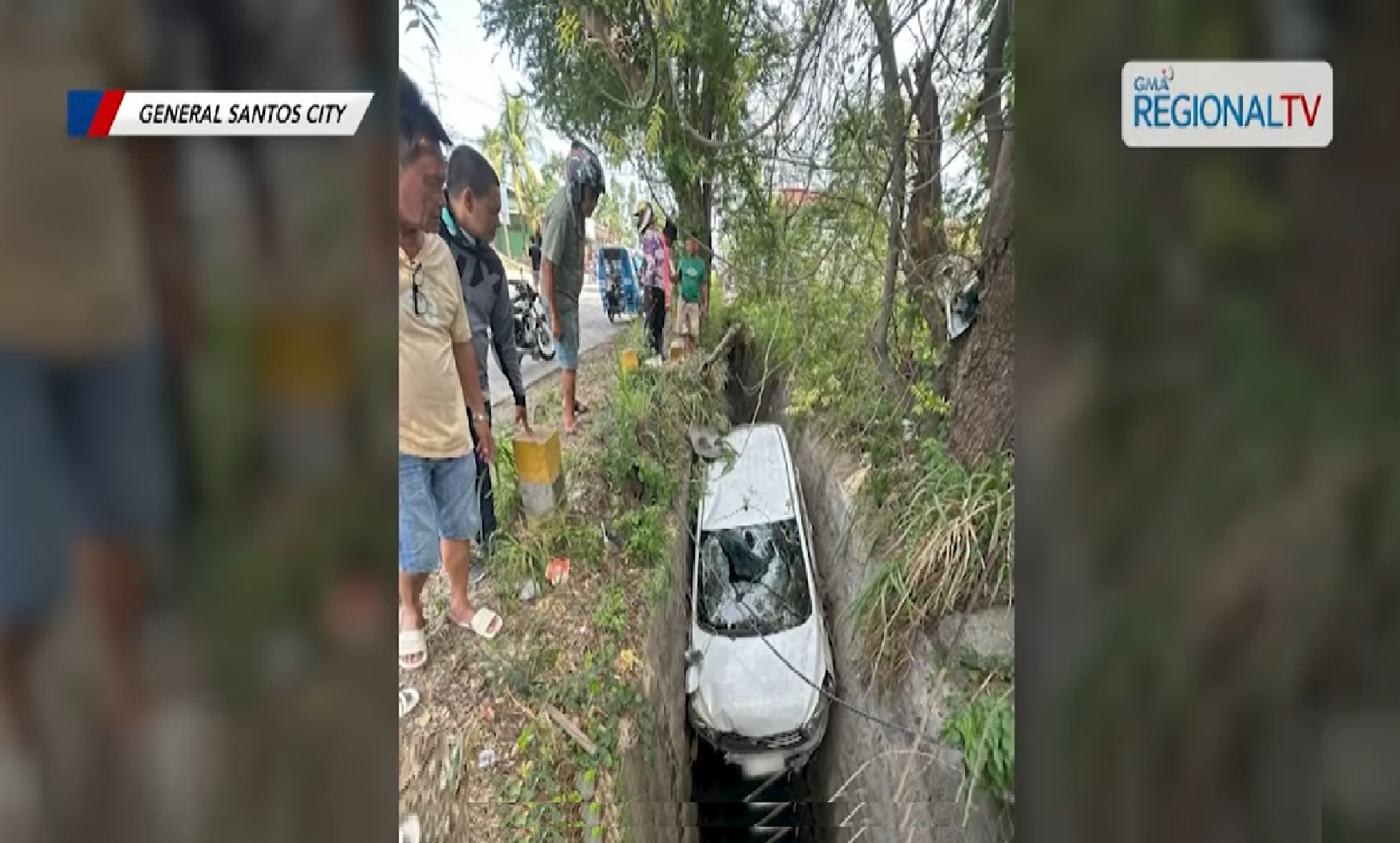 Kotse ng mga suspek sa pagnanakaw, na-shoot sa kanal sa GenSan