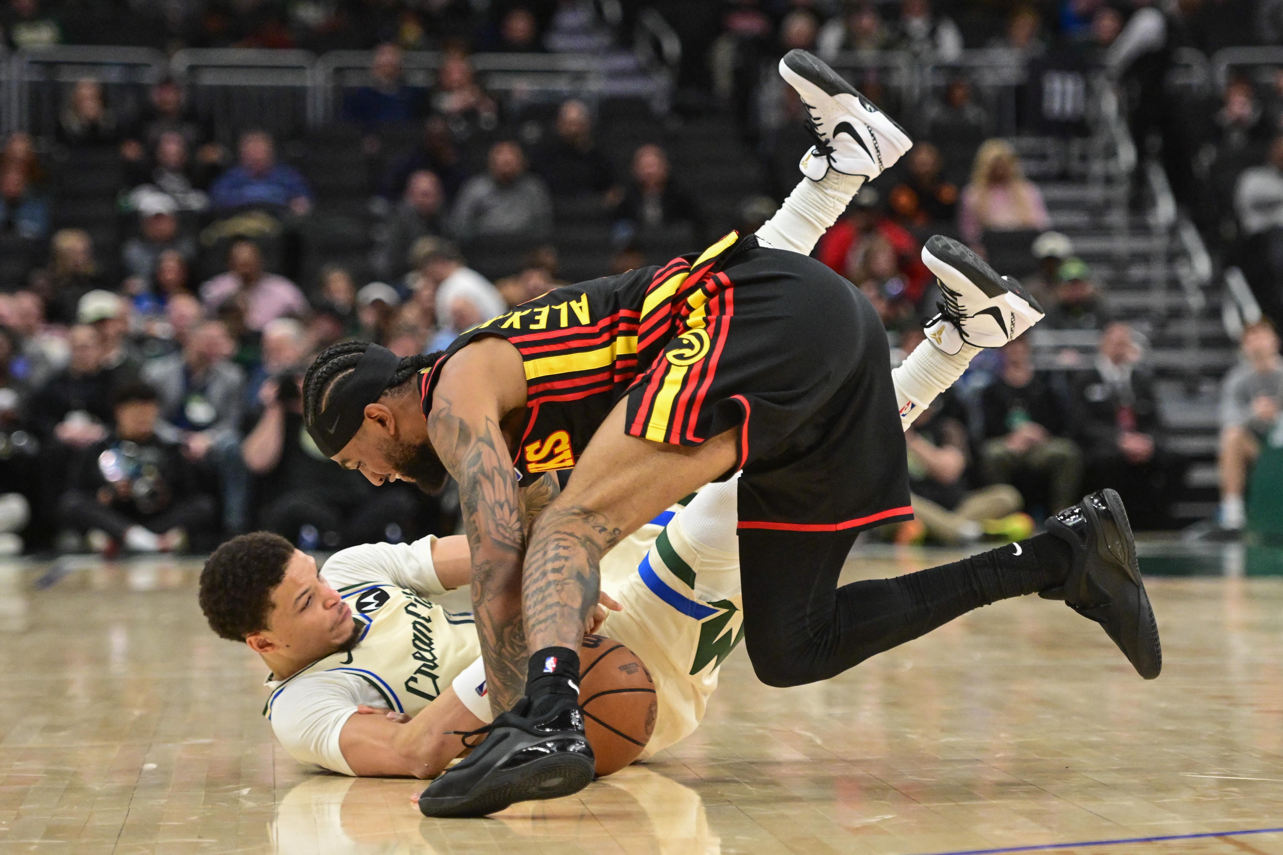 NBA: Hawks' Nickeil Alexander-Walker and Bucks' Ryan Rollins