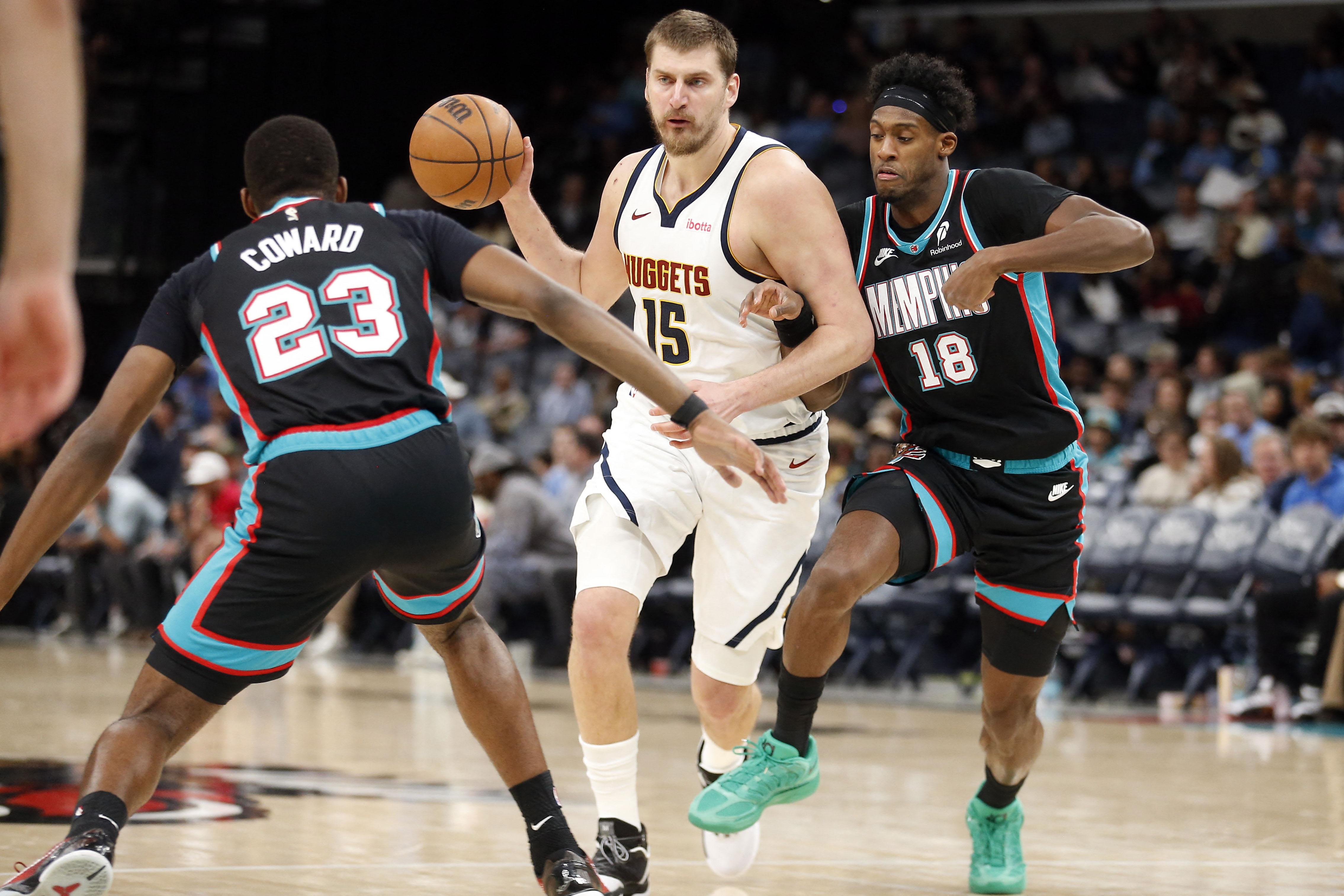 NBA: Grizzlies surprise Nuggets with gritty defense late