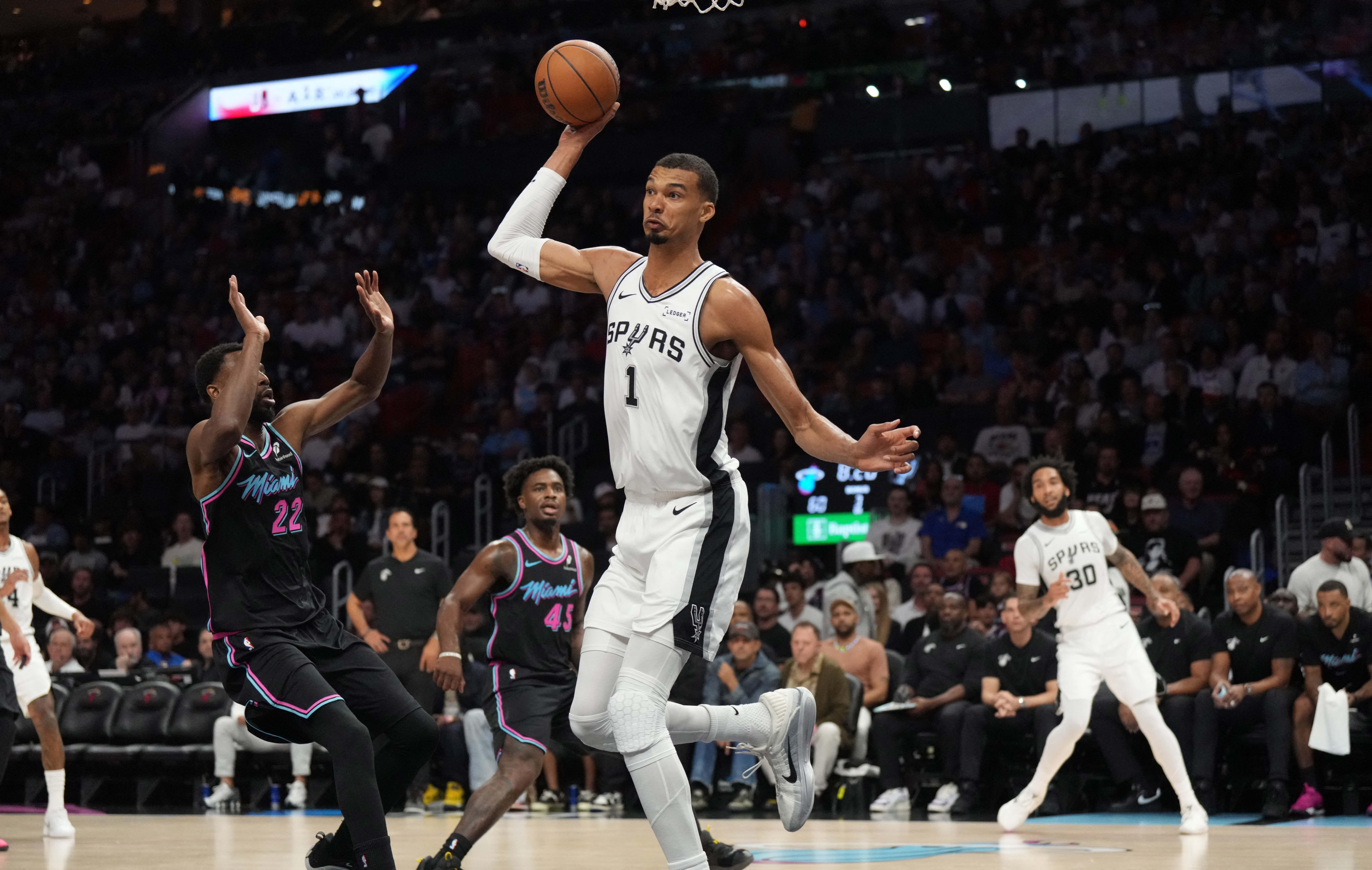 San Antonio Spurs forward Victor Wembanyama and Miami Heat forward Andrew Wiggins