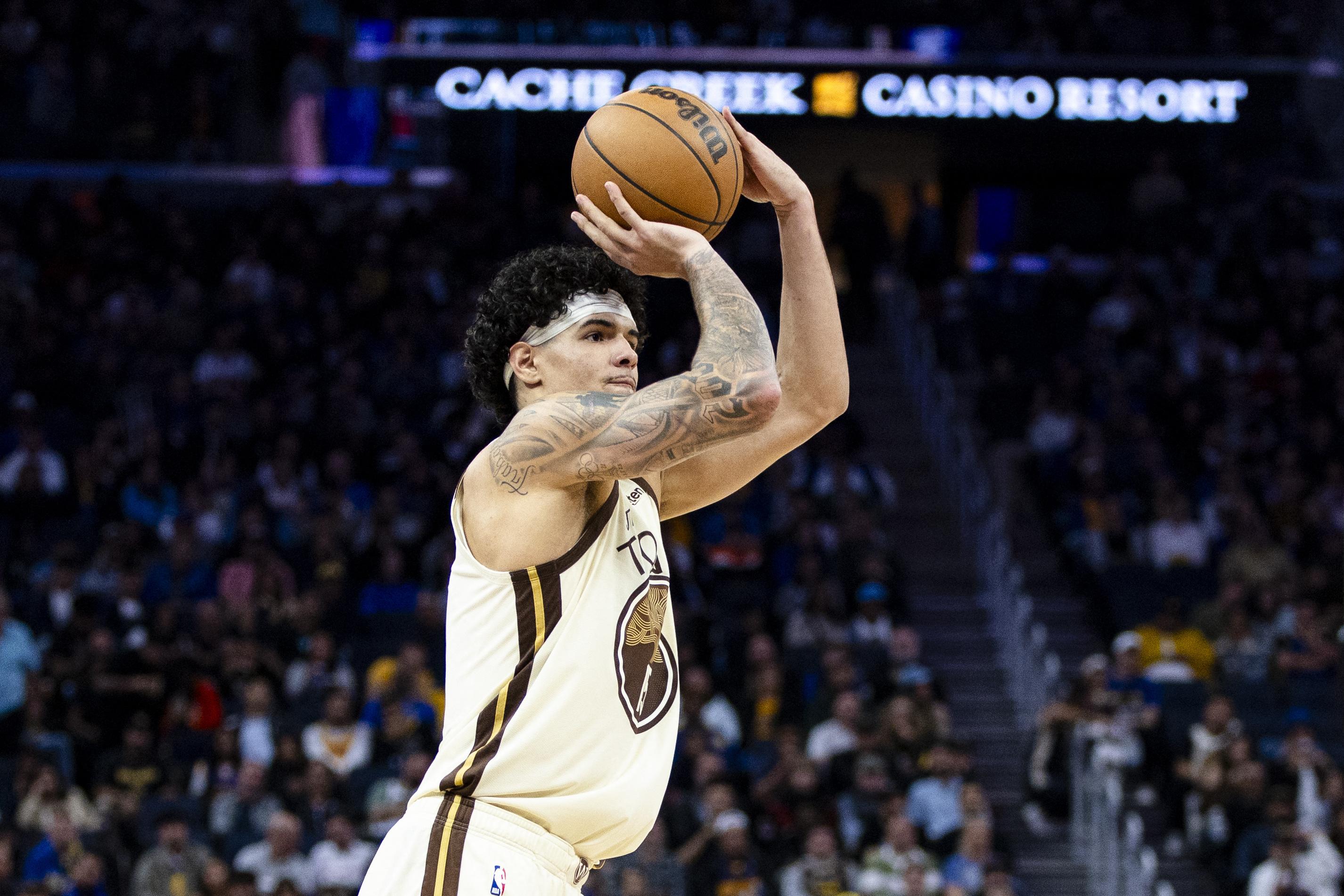 NBA: Gui Santos' career game helps Warriors rally, extend Nets' skid