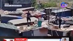 Wanted na lalaki, hinabol ng mga pulis hanggang sa bubungan