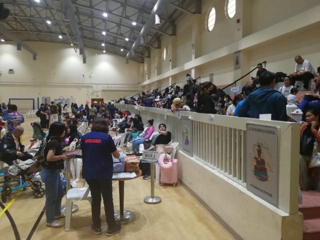 Filipinos wait in a school gym in Dubai prior to their repatriation to the Philippines on Friday, March 27, 2026. JOJO DASS