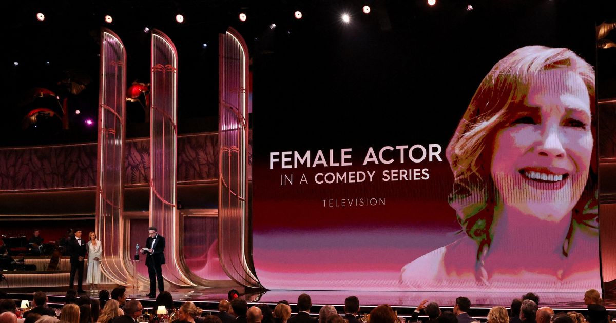  Seth Rogen accepts the Outstanding Performance By A Female Actor In A Comedy Series award on behalf of Catherine O'Hara for 