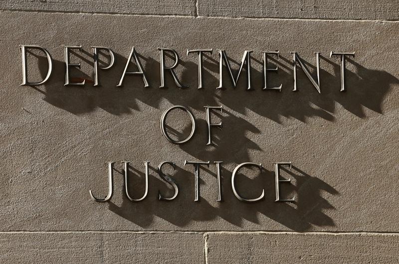 A sign for the US Department of Justice in Washington, D.C.