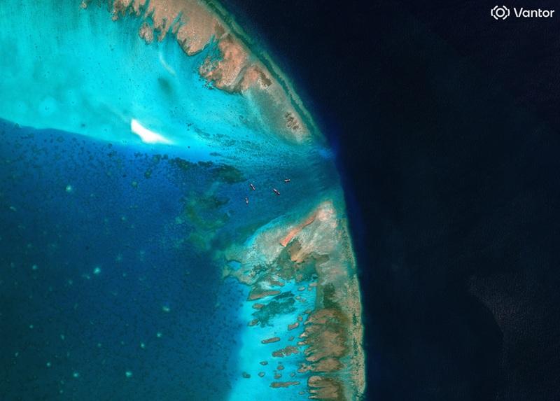 China moves to block entrance to disputed Scarborough Shoal, images show