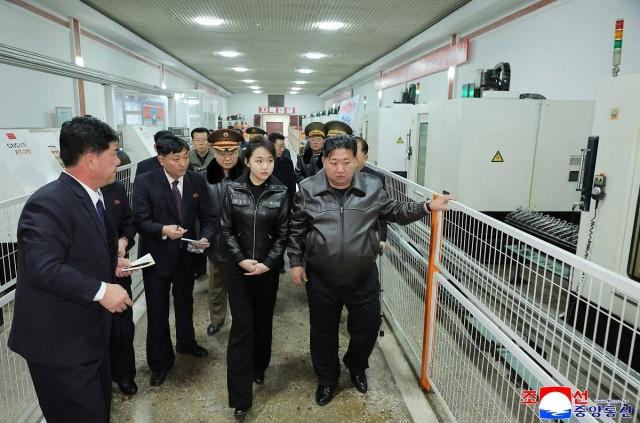 North Korean leader Kim Jong Un, accompanied by his daughter Kim Ju Ae, visits a munitions factory in Pyongyang, North Korea, in this picture released on March 12, 2026 by North Korea's official Korean Central News Agency. KCNA via REUTERS