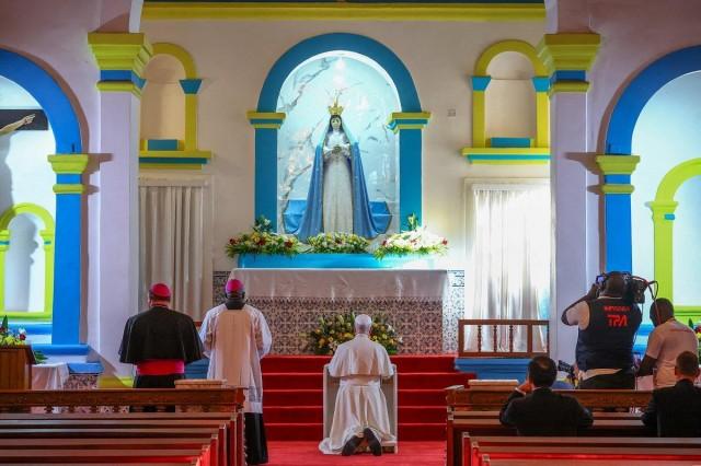 Pope Leo XIV prays inside the Church of Our Lady of Muxima, during his apostolic journey in Africa, in Muxima, Angola, April 19, 2026. REUTERS/ Guglielmo Mangiapane/ Pool