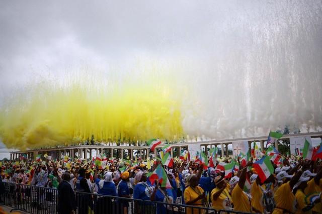 Fireworks emit smoke in the colors of the Vatican's flag on the day Pope Leo XIV is to hold a holy Mass at the Basilica of the Immaculate Conception in Mongomo, Equatorial Guinea, April 22, 2026. REUTERS/ Guglielmo Mangiapane