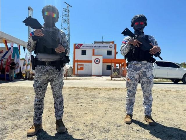 PCG Special Operations Group members stand guard outside the newly established Coast Guard District Kalayaan Island Group Headquarters on Pag-asa Island. (Photo by Jun Veneracion)