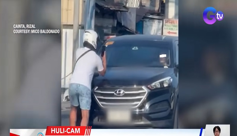 Rider, hinarang ang MPV na nakabangga umano sa kaniyang motorsiklo sa Rizal