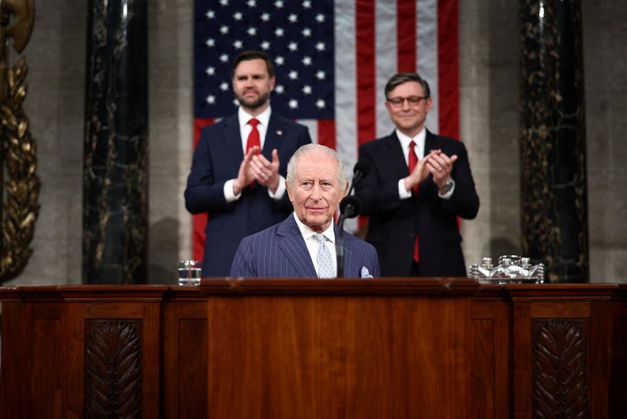 US Vice President JD Vance and US House Speaker Mike Johnson applaud as King Charles arrives