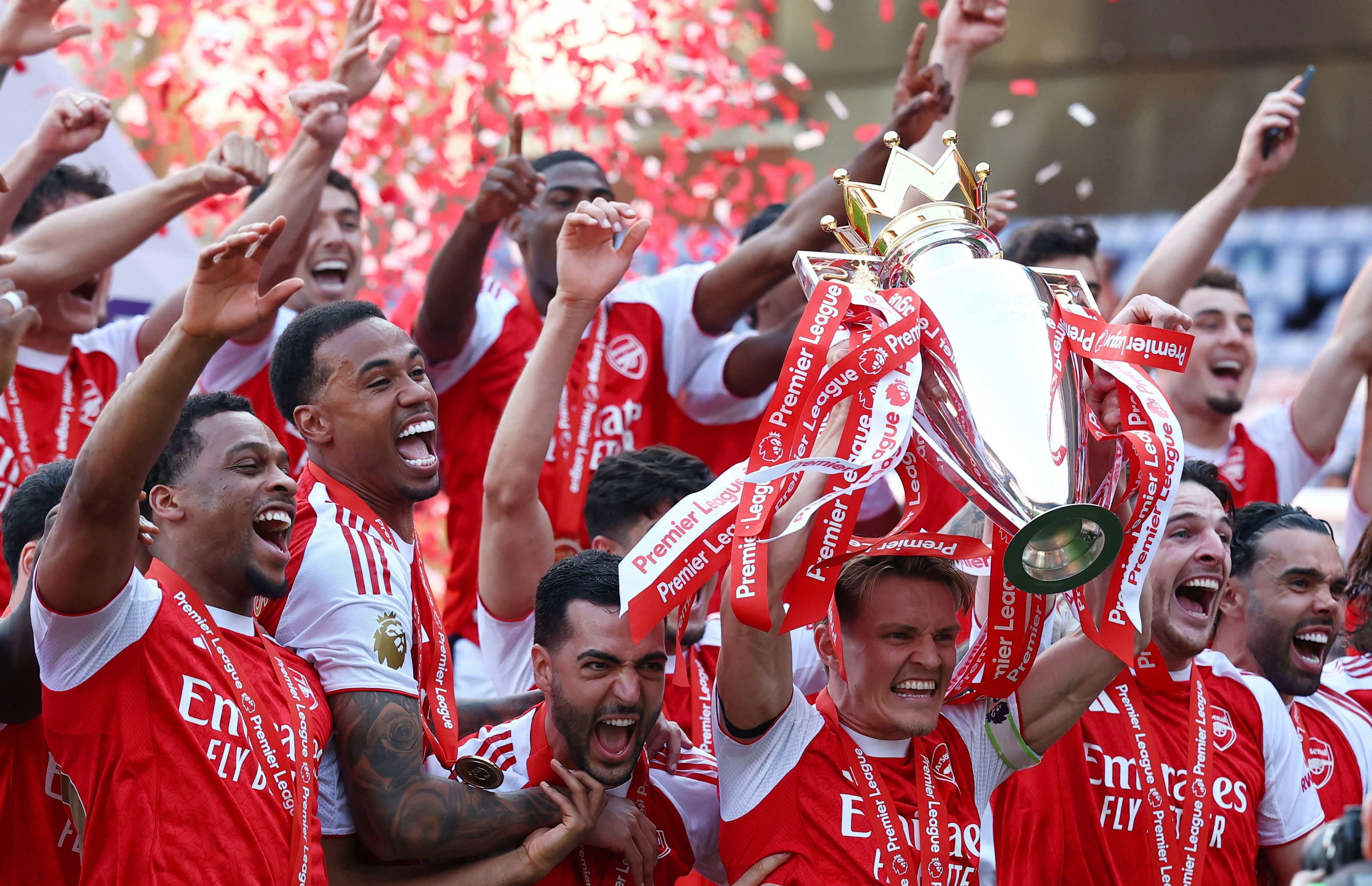 West Ham relegated, Arsenal lift Premier League trophy on emotional final day