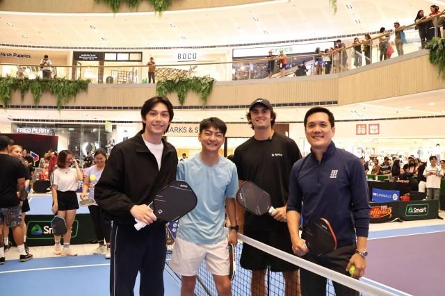 Fil-Canadian National Champion and PPA Tour athlete MacKonner Dy together with globally recognized pickleball star, PPA Champion and former World no.3 in Mixed Doubles James Ignatowich and Toby's Sports President Toby Claudio Jr. for the Toby's Super Series at SM North EDSA during the SM Active Hub Anniversary