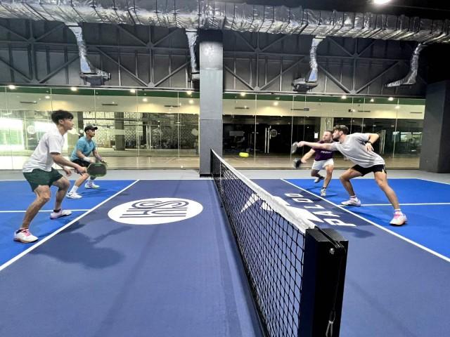 Pickleball players and content creators from lifestyle collective The Friday Crew at the pickleball court in Four E-Com