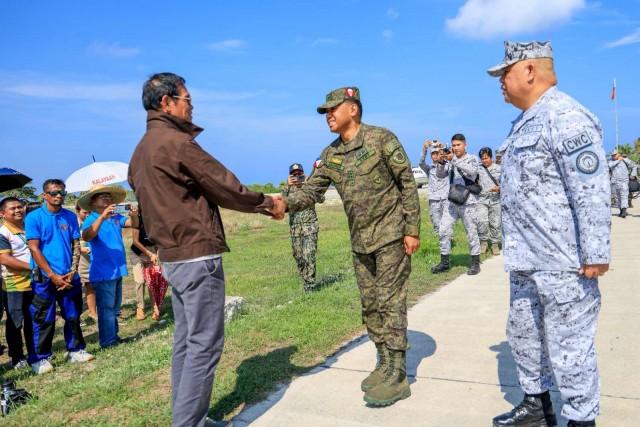 AFP Chief of Staff General Romeo S Brawner Jr. meets with Mayor Billy Alindogan of the Municipality of Kalayaan during his visit to Pag-asa Island in Kalayaan Island Group on May 22. Photo by SSg Ambay PA, Cpl Esteban PN(M) / PAOAFP