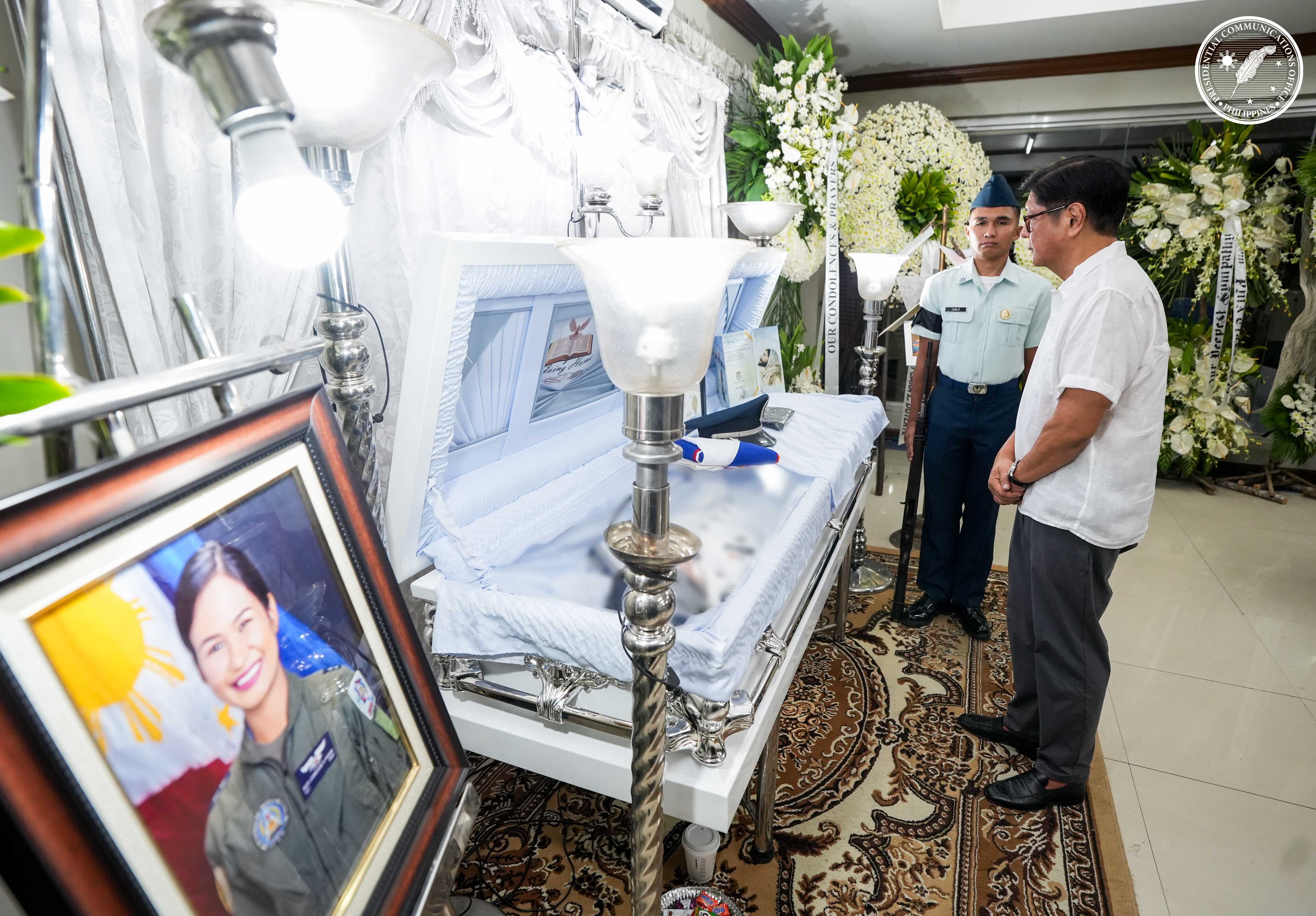 Marcos visits wake of Air Force personnel killed in aircraft crash 