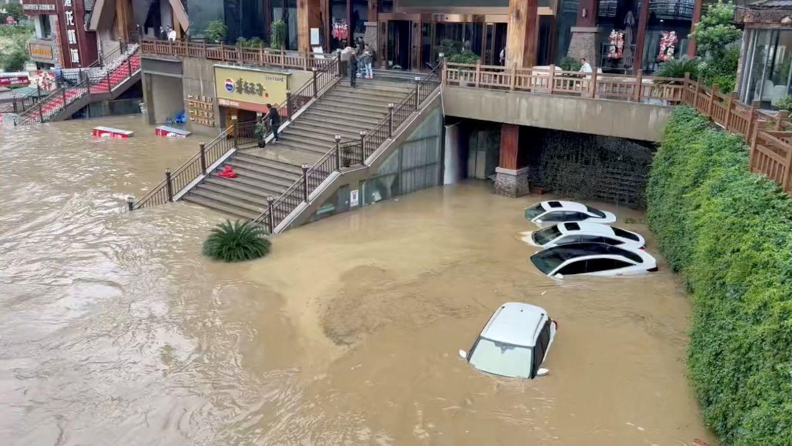 At least 12 killed as heavy rains drench southern, central China