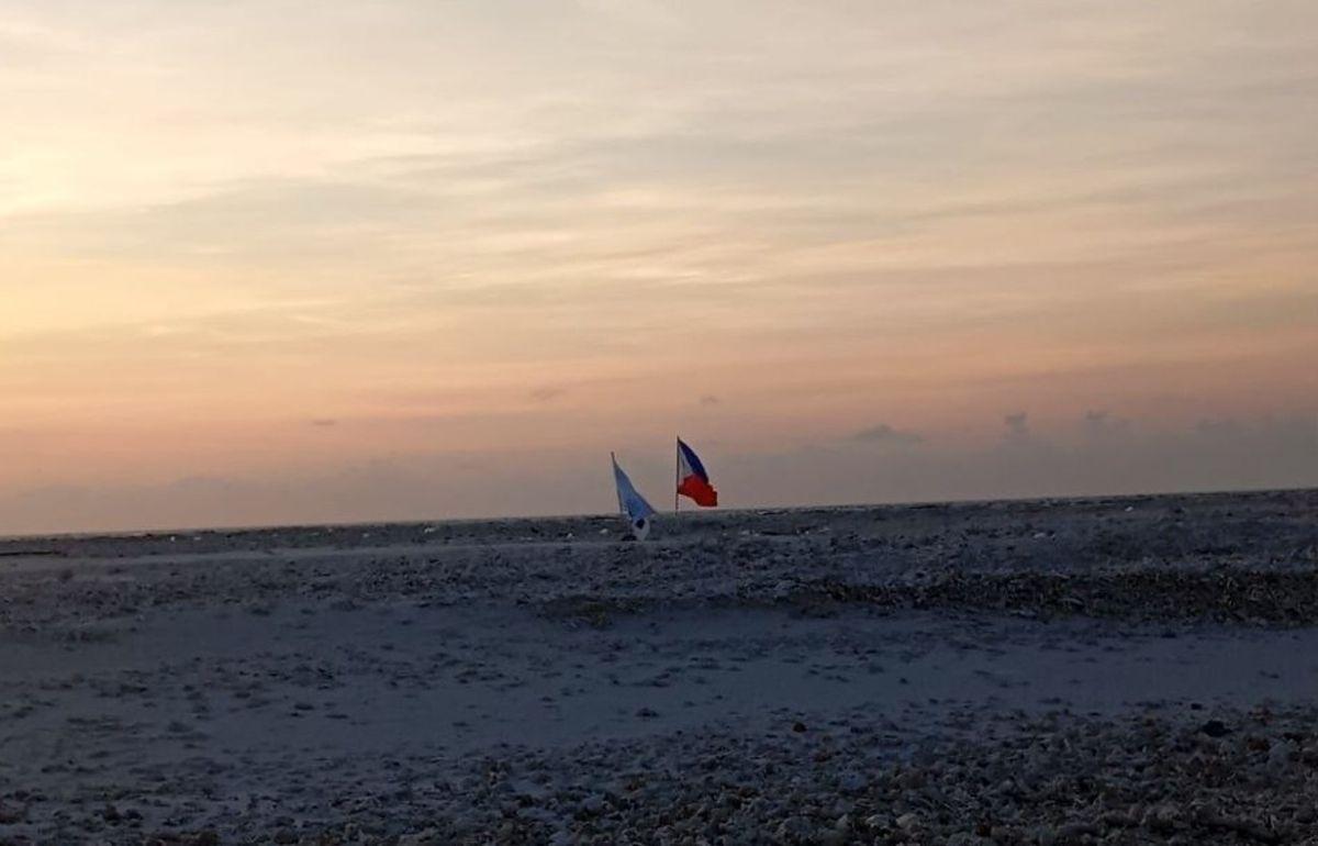 Philippin flag planted on Pagasa Cay 2 or Sandy Cay in West Philippine Sea
