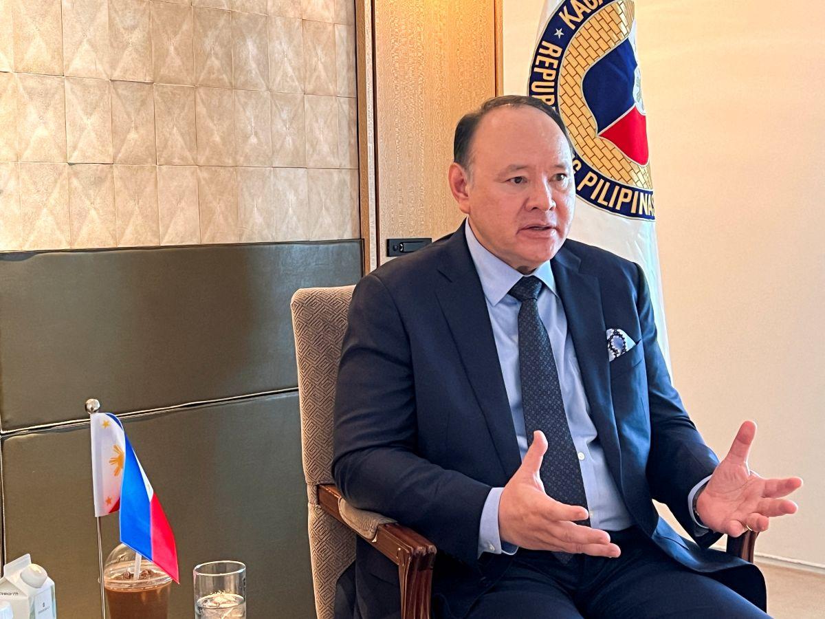 Defense Secretary Gilberto Teodoro Jr speaks during an interview at the IISS Shangri-La Dialogue security summit in Singapore