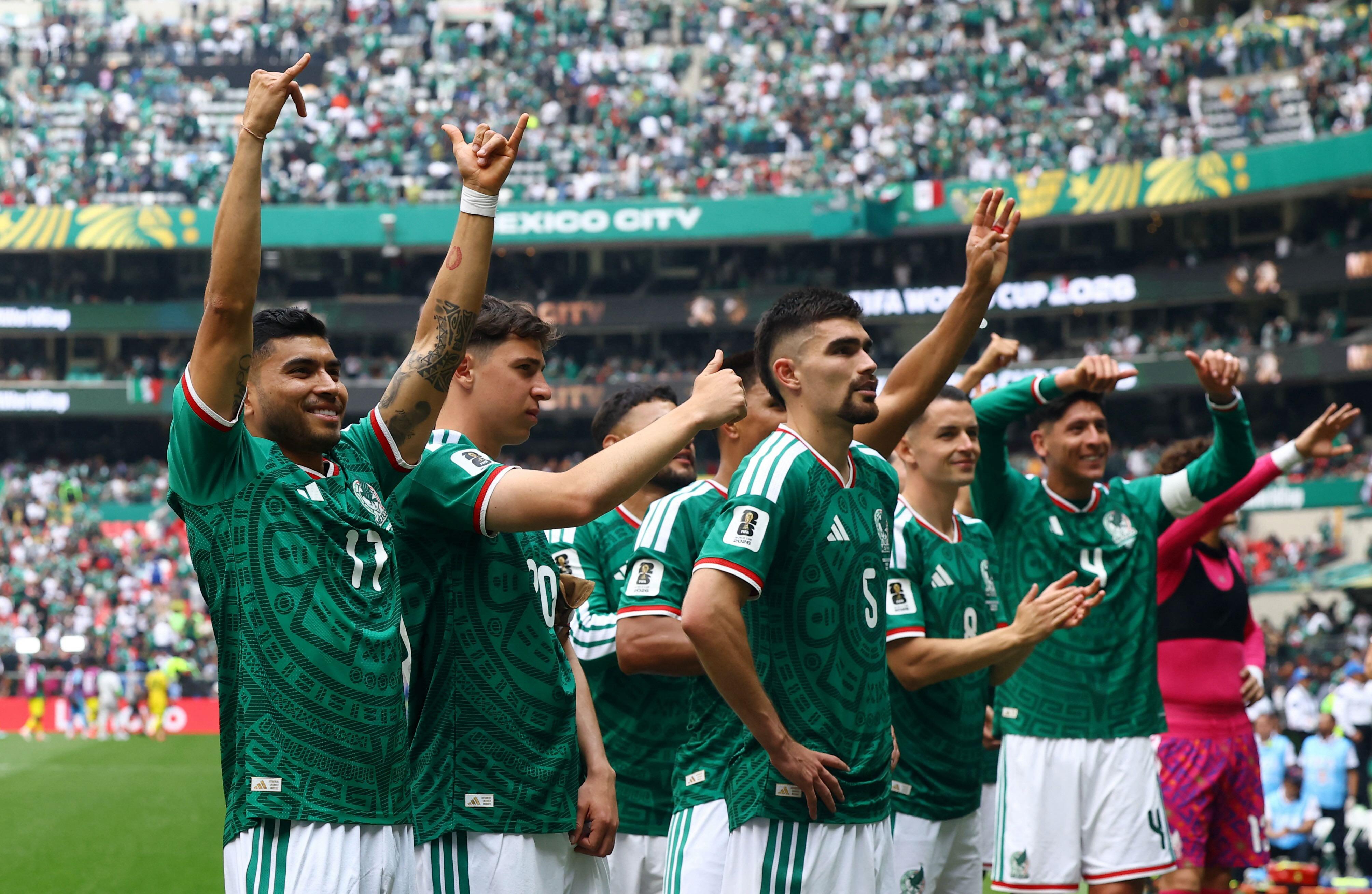 Mexicans celebrate breaking opening day curse with 2-0 win