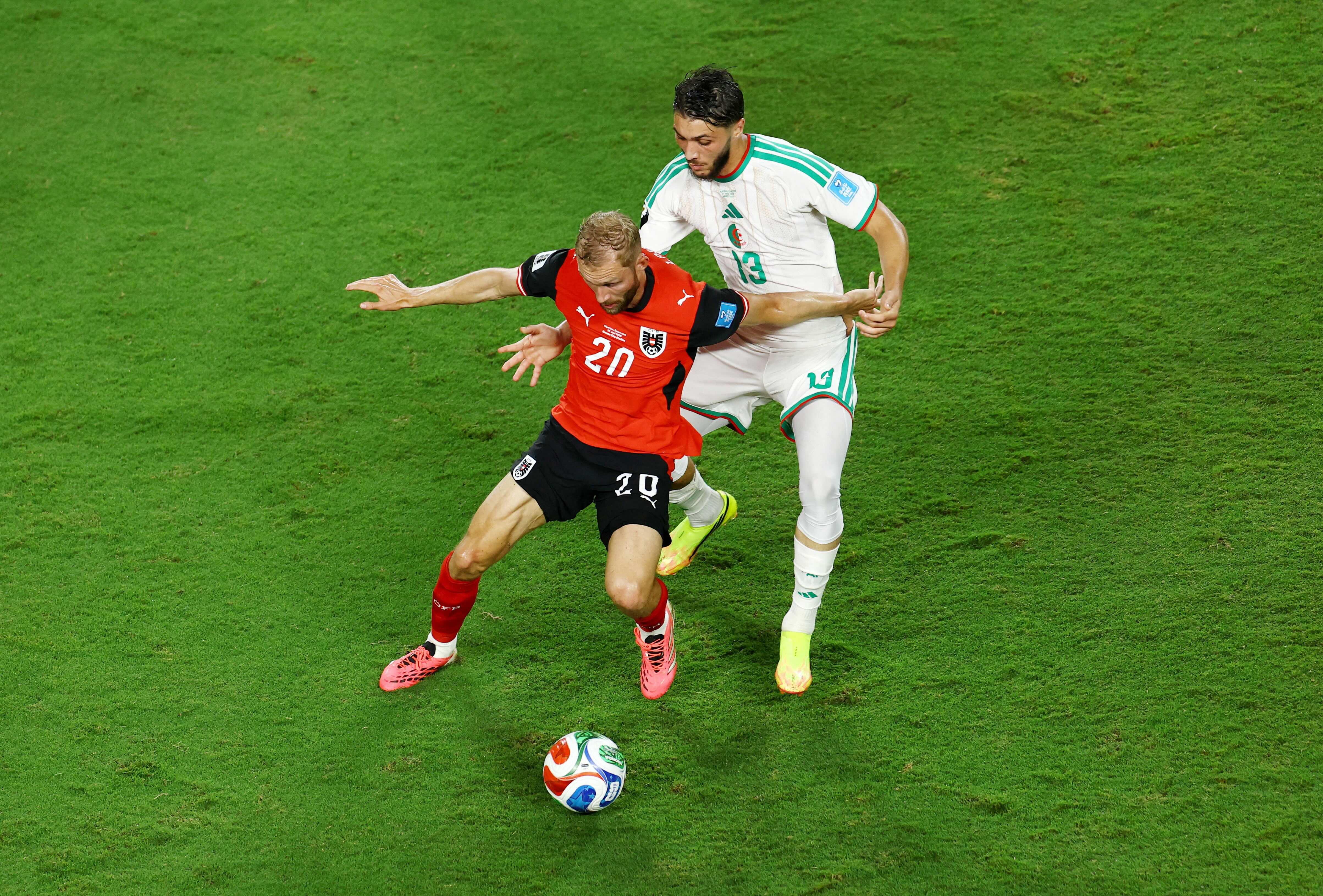FIFA World Cup: Austria draw with Algeria in thriller to progress and send Iran home