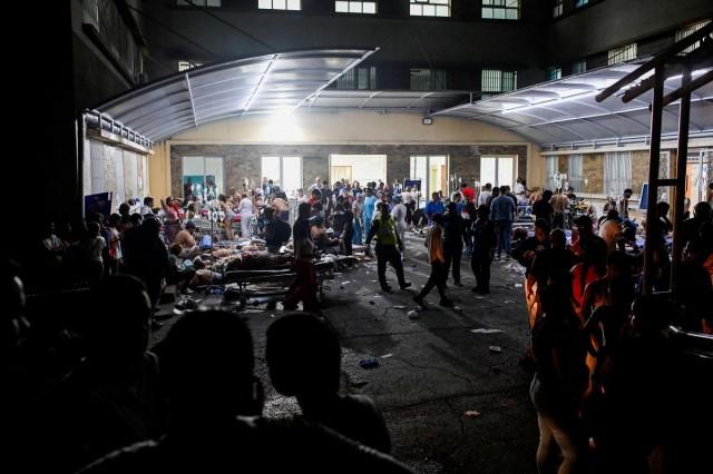 People receive treatment in a field hospital after the earthquakes, in La Guaira, Venezuela, June 24, 2026. REUTERS/ Maxwell Briceno