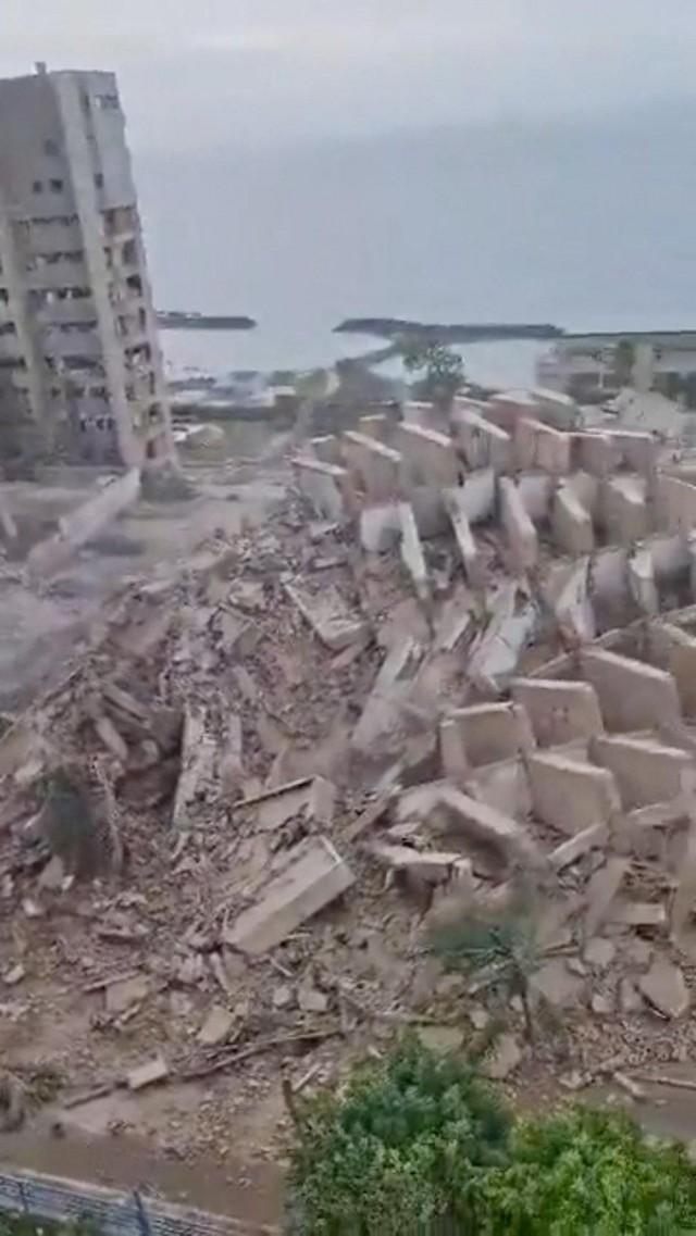Destroyed buildings and debris cover the shoreline, in the aftermath of the earthquakes, in La Guaira, Venezuela, June 24, 2026, in this screengrab taken from a social media video. Social media via REUTERS