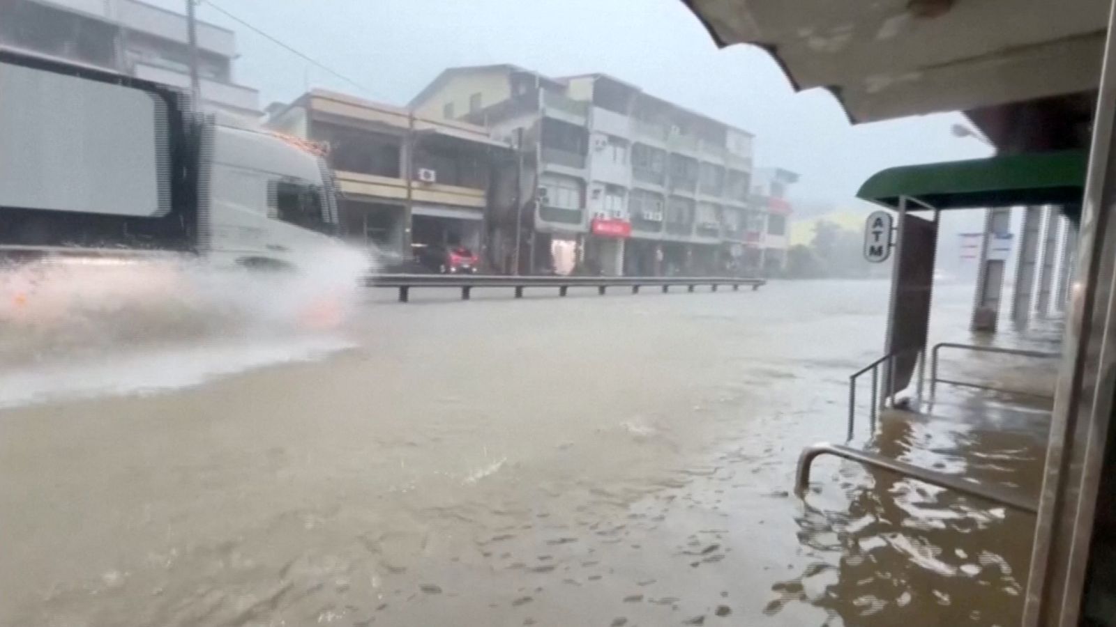 Japan braces for double storms, torrential rains shut down parts of Taiwan