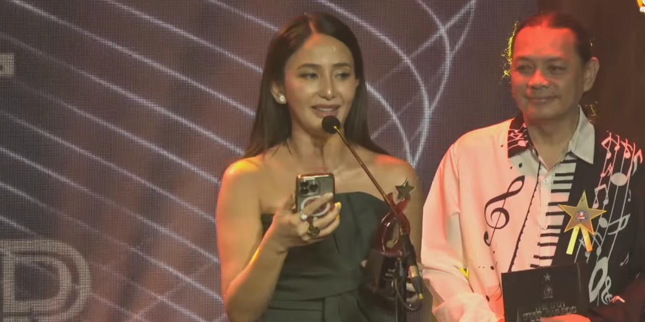 Katrina Halili accepts trophy for Kris Lawrence at PMPC Star Awards for Music 2026