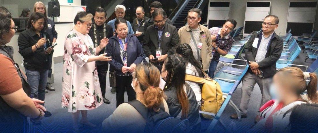 DFA Sec. Ma. Theresa Lazaro welcomes back to PH the OFWs detained in Russia