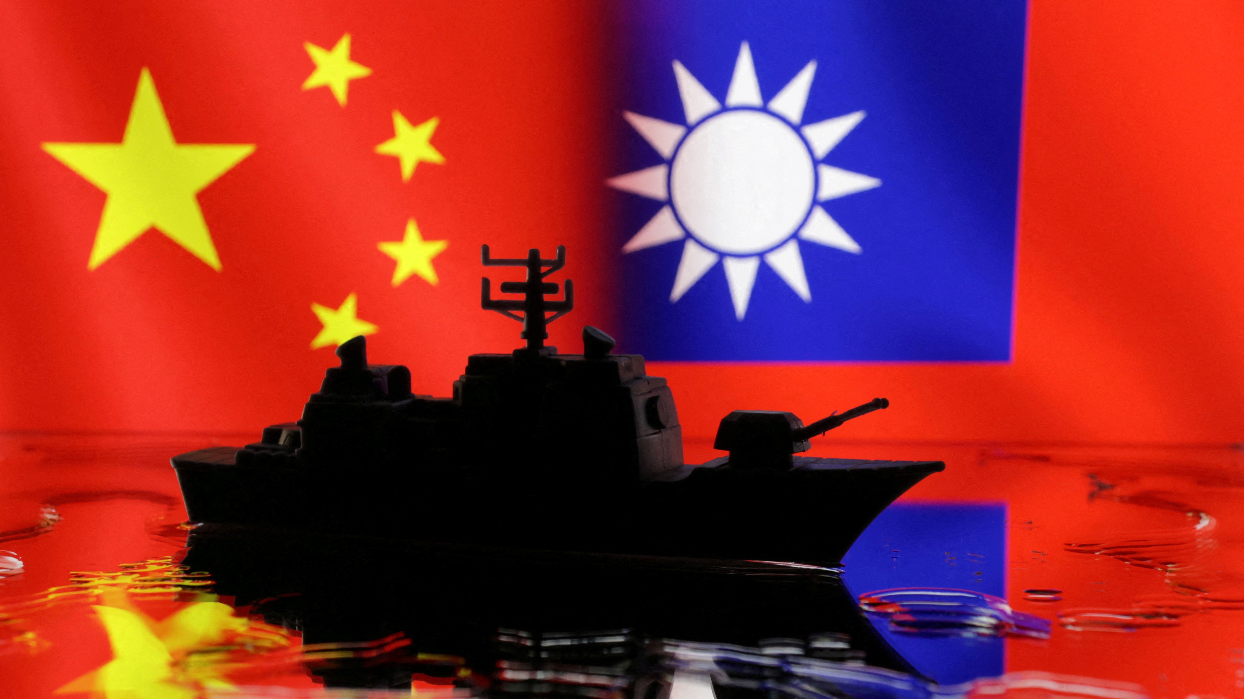 Taiwan says Chinese coast guard, research ships near key South China Sea islands