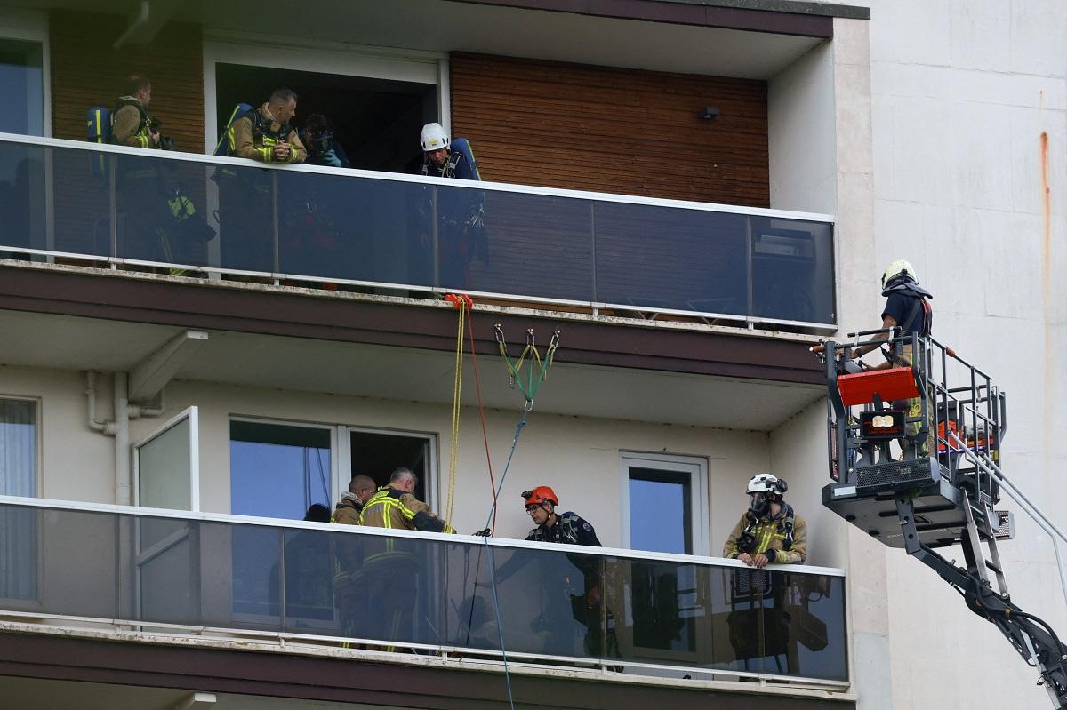 At least 5 people killed in fire in Antwerp apartment tower, Belgian police say