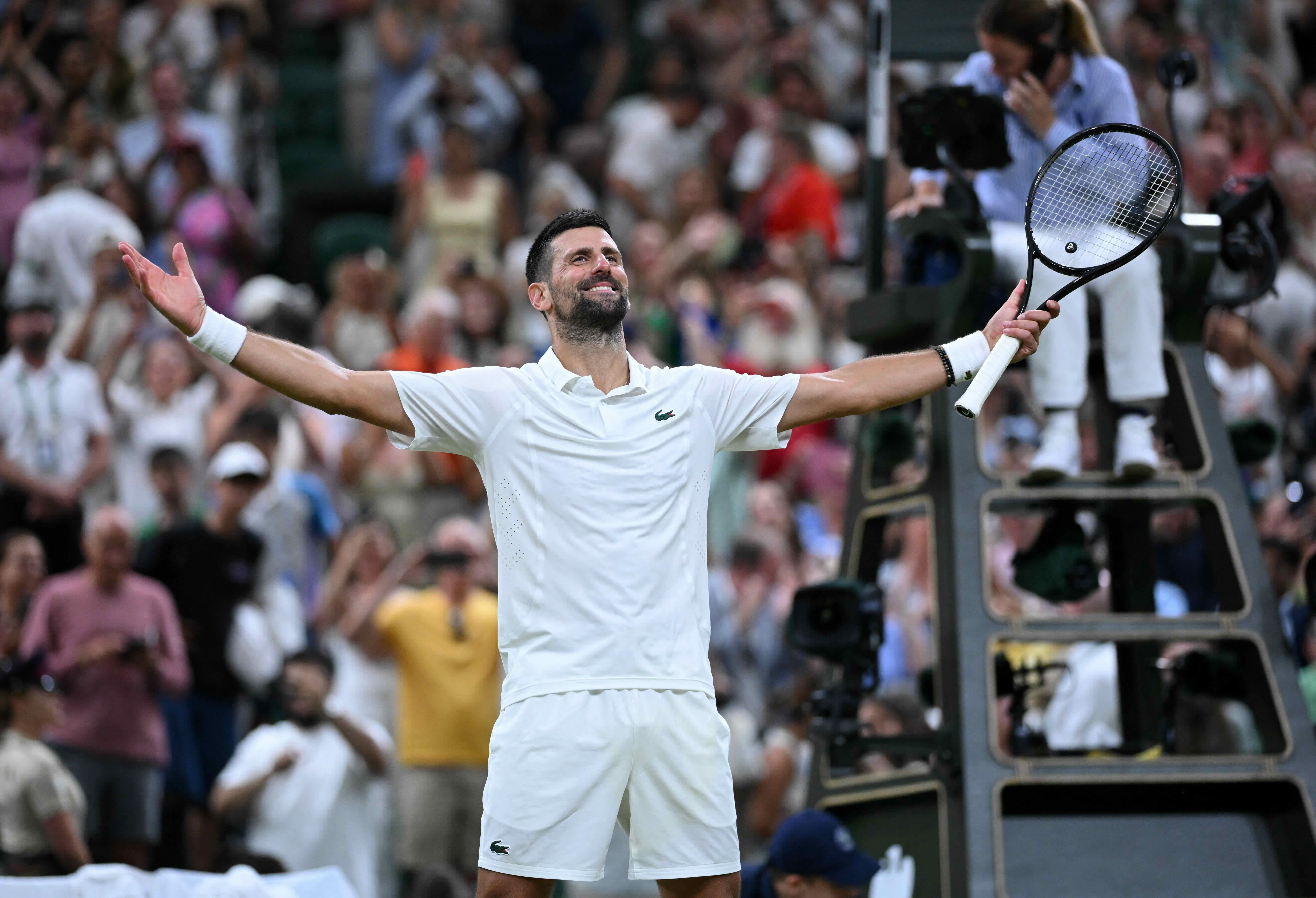 'Racket and heart' as Djokovic tames Auger-Aliassime to return to Wimbledon semis