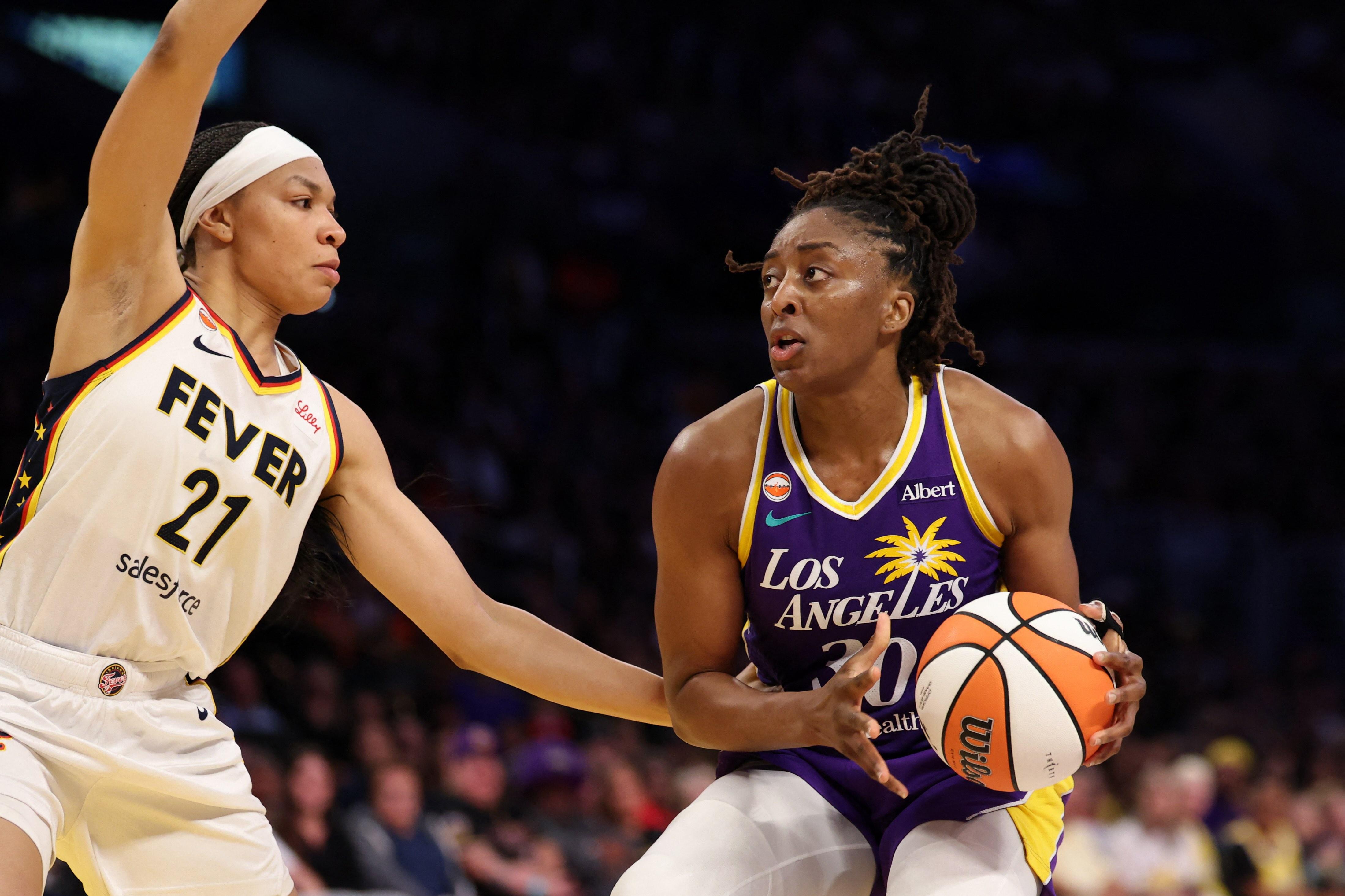 Nneka Ogwumike, Rae Burrell guide Sparks to victory over Fever