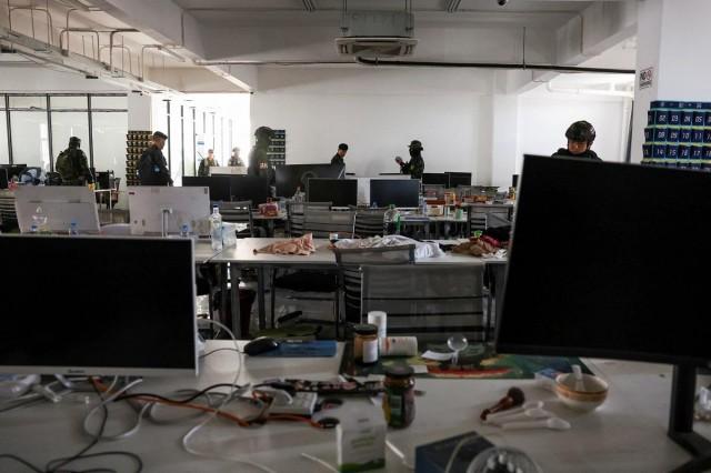 Thai soldiers walk inside a workstation at the compound at the Chong Chom-O'Smach border crossing in Samraong, Oddar Meanchey province, Cambodia, March 6, 2026. REUTERS/ Chalinee Thirasupa
